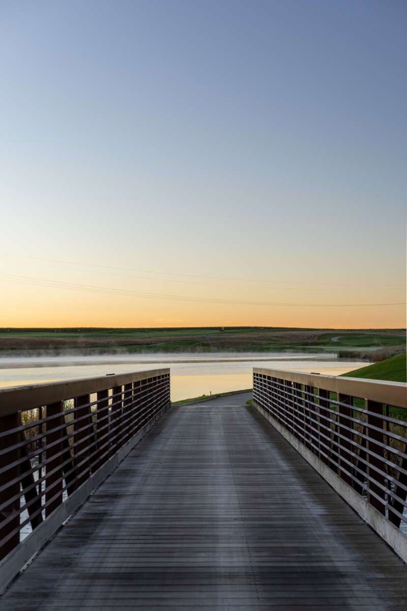 Boardwalk leading toward the water at sunset, Grand Falls Casino & Resort